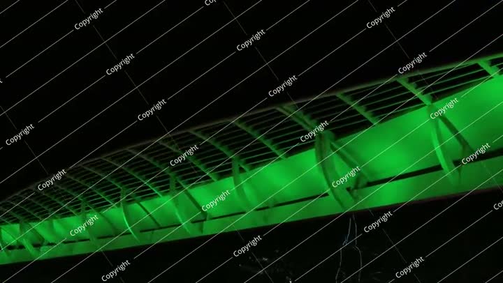 Saudi National Day green-lit skyscraper at night video