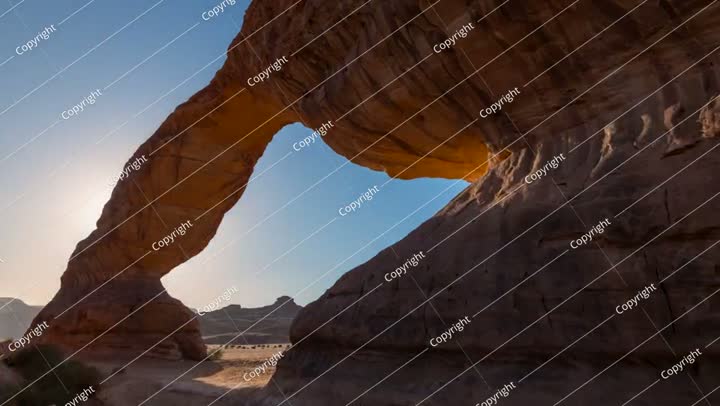 Time lapse of Sunset motion in rainbow arch,  Al ula, Madinah,  Saudi Arabia
