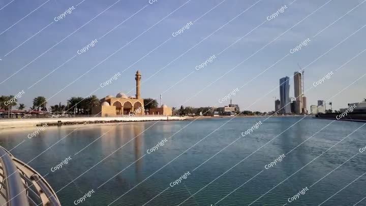 Waterfront Mosque reflecting on Jeddah Corniche at sunset, Saudi Arabia