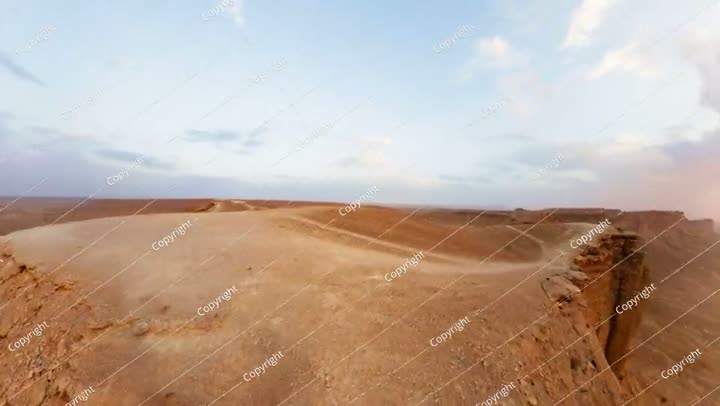 Panoramic view of edge of the world at sunset in Tuwaiq cliffs of Saudi Arabia