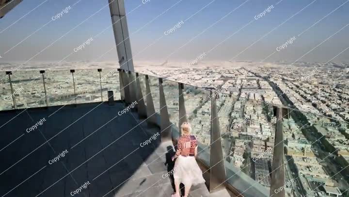 Tourist enjoying panoramic view of Riyadh skyline in Saudi Arabia
