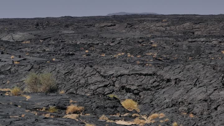Famous tourist attractions, located in the Harrah of Khaybar northeast of Medina, a rare and strange site, the black rock formations, the history of the earth in the language of rocks and lava.