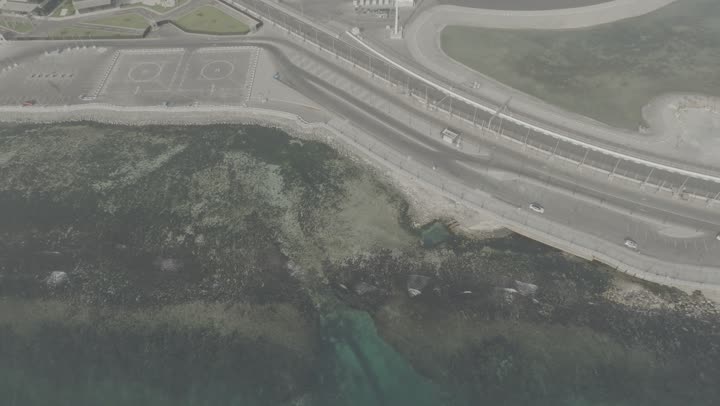 The landscapes in coastal cities, the focus on planting green plants and palm trees in tourist areas, the view of the waterfront in the Kingdom, drone photography of the Formula racing circuit on the Corniche of Jeddah, the architectural engineering art of buildings.