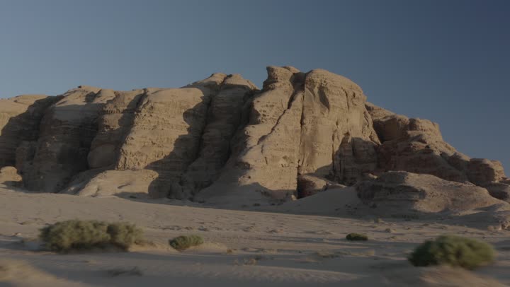 Historical and archaeological tourist sites, desert and mountainous nature, natural rock formations in Madain Saleh in Al-Ula Governorate in the Kingdom of Saudi Arabia, drone photography of the mountains and rock formations in Al-Ula Governorate.