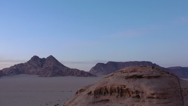 Historical and archaeological tourist sites, desert and mountainous nature, natural rock formations in Madain Saleh in Al-Ula Governorate in the Kingdom of Saudi Arabia, drone photography of the mountains and rock formations in Al-Ula Governorate.