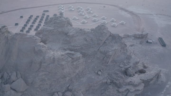 The desert and mountainous nature, the natural rock formations in Al-Ula's Madain Saleh in the Kingdom of Saudi Arabia, drone photography of the mountains and rock formations in Al-Ula, historical archaeological tourist sites and landmarks.