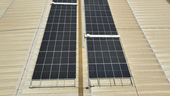 Saudi Vision 2030, solar cells for generating alternative energy, sustainable development and improvement of renewable and clean energy sources in Saudi Arabia, drone footage of a group of solar panels in wide spaces, satellite, the future of energy, energy engineering systems, renewable energy.