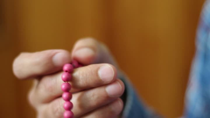 The concept of contemplating the chapters of the Holy Quran, a prayer bead made of beads, a place designated for worship, obedience, and drawing closer to God, the noble Quran and the prayer beads of glorification, reflecting on the Quranic verses and pondering over them, and committing to the daily recitation.