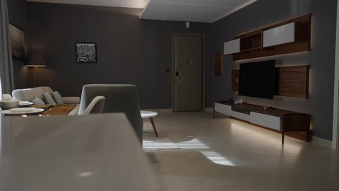 عرض غرفة المعيشة بتصميم مودرن، تصوير لغرفة المعيشة ، تصاميم عصرية و جذابة ، ديكورات رائعة ، أثاث منزلي راقي ، تصاميم فخمة و جميلة ، شقق سكنية