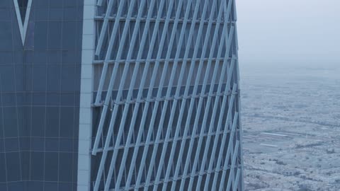 Achieving economic and commercial renaissance, growth and urban development in Saudi Arabia, King Abdullah Financial Center (KAFD), close-up drone photography of financial institutions and towers in Riyadh, the architectural engineering art of the famous buildings and skyscrapers in the Kingdom.