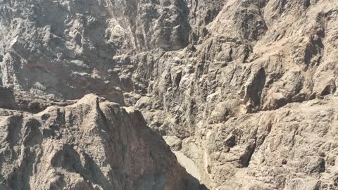 The rock formations and structures in Wadi Tayeb Asm in the Tabuk region, the mountain ranges in desert areas, drone photography of the terrain and rock carvings in the famous historical archaeological sites in Saudi Arabia.