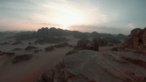 A global center for winter sports and adventures, drone photography of the towering mountains with rock formations in the Tabuk region, desert near Jeddah in Neom, northwest of the Kingdom of Saudi Arabia, a luxurious mountain tourist destination, the beauty of the desert landscapes in Saudi Arabia.