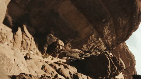 A global center for winter sports and adventures, drone photography of the towering mountains with rock formations in the Tabuk region, desert near Jeddah in Neom, northwest of the Kingdom of Saudi Arabia, a luxurious mountain tourist destination, the beauty of the desert landscapes in Saudi Arabia.