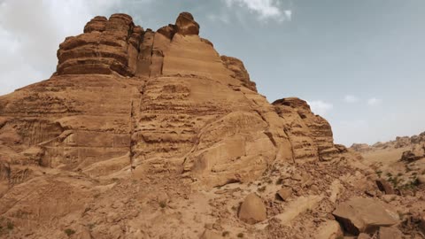The beauty of the desert landscapes in Saudi Arabia, a global center for winter sports and adventures, drone photography of the towering mountains with rock formations in the Tabuk region, desert in Jeddah in Neom, northwest of the Kingdom of Saudi Arabia, a luxurious mountain tourist destination.
