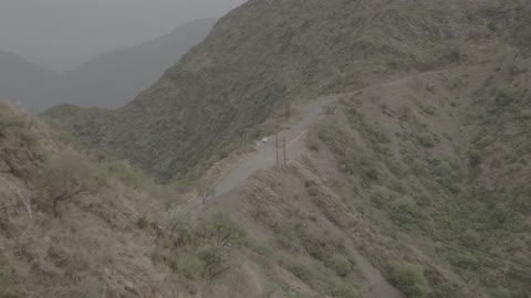 Aerial drone photography of the mountains of Al-Baha and Asir, the southern nature in the Kingdom of Saudi Arabia, famous tourist attractions in Riyadh, the peaks and mountain heights.