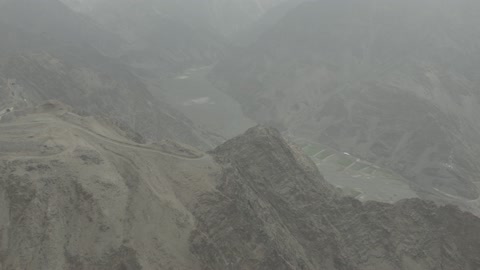 Aerial drone photography of the mountains of Al-Baha and Asir, the southern nature in the Kingdom of Saudi Arabia, famous tourist attractions in Riyadh, the peaks and mountain heights.