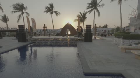 Famous tourist places and landmarks in the Kingdom of Saudi Arabia, clear waters and sunset views, aerial drone photography of Oya Beach Resort in Jeddah, a calm beach, the waterfront.