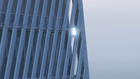 Famous landmarks of Riyadh, the growth and urban development of skyscrapers in the Kingdom of Saudi Arabia, the architectural engineering art of financial towers and economic facilities in the capital, aerial drone photography of the King Abdullah Financial Center "KAFD" at sunrise.