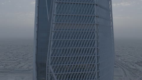 النمو والتطور العمراني لناطحات السحاب في المملكة العربية السعودية، الفن الهندسي المعماري للأبراج المالية والمنشآت الاقتصادية في العاصمة، تصوير درون جوي لمركز الملك عبد الله المالي "كافد" وقت شروق الشمس ، معالم الرياض المشهورة