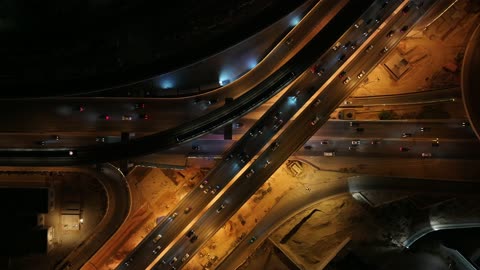 Famous tourist attractions in Saudi Arabia, the towers and skyscrapers in the Kingdom, car traffic on King Fahd Road at night, the economic and urban renaissance of Riyadh in Saudi Arabia, the distinctive architectural engineering art in the city of Riyadh.