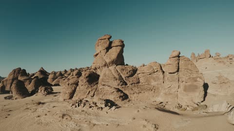 Photography of the Al-Ula region in the northwest of the Kingdom of Saudi Arabia, the sculpted Al-Gharamil mountains, rock formations in the Saudi desert.
