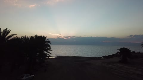 Forests in the mountains and highlands, mountain natural phenomena, a good name in the Neom area, natural landmarks of Tabuk, mountain formations, cultural and tourist landmarks, drone photography of the road leading to the sea water in Tabuk, Saudi Arabia, tourism in Saudi Arabia.
