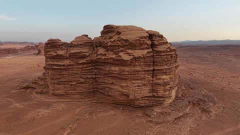 Enjoying many activities such as jeep safari trips, drone photography of Shuqri Mountains in Tabuk, Saudi Arabia, mountain formations, Shuqri gorge, mountains and highlands, desert terrain, mountainous nature, mountain fault, natural landmarks of Tabuk, tourism in Saudi Arabia.