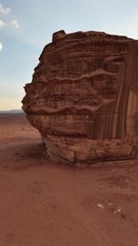 The red sandstone that has been subjected to natural erosion factors, drone photography of the Shuqri Mountains in Tabuk, Saudi Arabia, mountain formations, Shuqri Valley, mountains and highlands, desert terrain, mountainous nature, mountain fault, natural landmarks of Tabuk, tourism in Saudi Arabia.