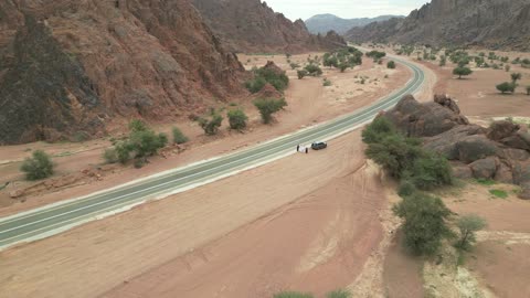 The Aja Mountains in the city of Hail, the natural landscapes and tourist attractions in the Kingdom of Saudi Arabia, aerial drone photography of the rugged terrain of the Aja Mountains in Tuwaran, the peaks and highlands in the mountainous areas, nature background.