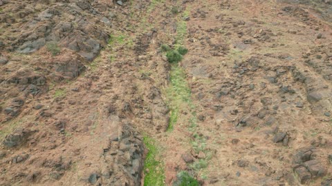 The Aja Mountains in the city of Hail, the natural landscapes and tourist attractions in the Kingdom of Saudi Arabia, aerial drone photography of the rugged terrain of the Aja Mountains in Tuwaran, the peaks and highlands in the mountainous areas, nature background.