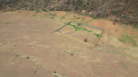 The Aja Mountains in the city of Hail, the natural landscapes and tourist attractions in the Kingdom of Saudi Arabia, aerial drone photography of the rugged terrain of the Aja Mountains in Tuwaran, the peaks and highlands in the mountainous areas, nature background.