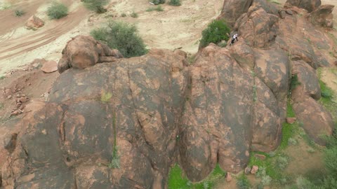 The desert nature, Aja Mountains in the city of Hail, tourist attractions in the Kingdom of Saudi Arabia, aerial drone photography of the rugged terrain of Aja Mountains in Tuwaran, the peaks and highlands in the mountainous areas, nature background.