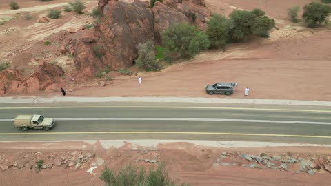 The Aja Mountains in the city of Hail, the natural landscapes and tourist attractions in the Kingdom of Saudi Arabia, aerial drone photography of the rugged terrain of the Aja Mountains in Tuwaran, the peaks and highlands in the mountainous areas, nature background.