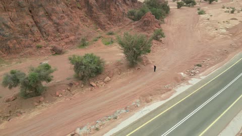The Aja Mountains in the city of Hail, the natural landscapes and tourist attractions in the Kingdom of Saudi Arabia, aerial drone photography of the rugged terrain of the Aja Mountains in Tuwaran, the peaks and highlands in the mountainous areas, nature background.