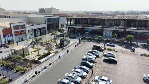 Practicing hobbies and entertaining games, a place for play and fun and spending enjoyable time, modern and advanced architectural engineering art in the Kingdom of Saudi Arabia, distinctive cafes and play areas, drone photography of billiards and cafes in Tabuk on Prince Fahd bin Sultan Road in the city of Tabuk during the daytime.