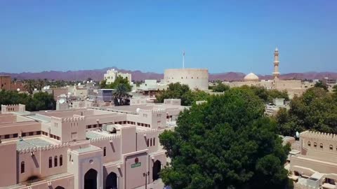 A depiction of Nizwa Fort in the Sultanate of Oman, the capital of Islamic culture, famous landmarks of Oman, architectural engineering art, tourism in Oman.