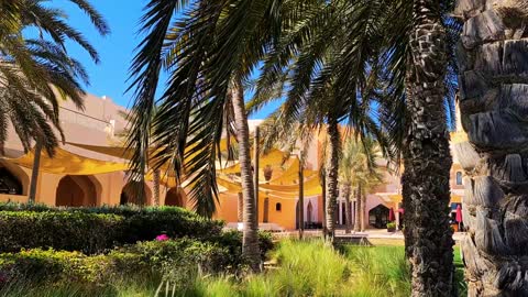 A panoramic image of a hotel resort on the beach in Muscat, famous tourist landmarks, natural background.