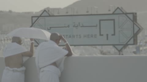 The spiritual atmosphere during the performance of the greatest pillar of Hajj, sacred Islamic religious places and landmarks, aerial drone footage of the pilgrims of the House of God wearing the Ihram in Mina in Mecca, the Hajj season in Saudi Arabia, worship and drawing closer to God Almighty.