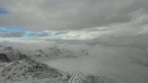 Snowfall, low-pressure system, winter atmosphere, cultural and tourist landmarks in the Kingdom of Saudi Arabia, the snow-covered Al-Lawz mountain range in the Trogina area, aerial drone photography of rock formations in the village of Jeddah Neom in the west of the Kingdom of Saudi Arabia, sculpted mountains and geological formations in the city of Tabuk.