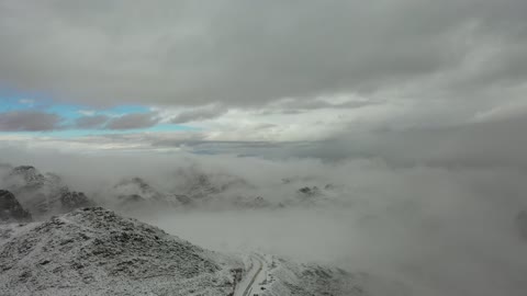 Low pressure system, snowfall, winter atmosphere, cultural and tourist landmarks in the Kingdom of Saudi Arabia, the snow-covered Al-Lawz mountain range in the Trogina area, aerial drone photography of rock formations in the village of Jeddah Neom in the west of the Kingdom of Saudi Arabia, sculpted mountains and geological formations in the city of Tabuk.