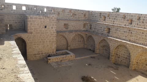 An old place and tourist landmark, a drone shot of the historical archaeological castle of Dhath Al-Haj in the village of Dhath Al-Haj, the center of Hala Ammar in the Tabuk region, northwestern Saudi Arabia, showcasing architectural engineering art in the old style.
