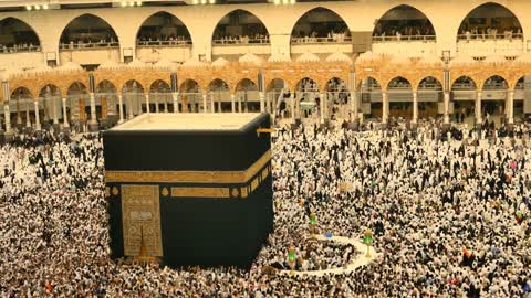 Islamic religious landmarks, worship and drawing closer to God, performing the rituals of Hajj and Umrah, the Holy Mosque in Mecca, Saudi Arabia, Muslim pilgrims performing prayers around the Kaaba in Mecca.