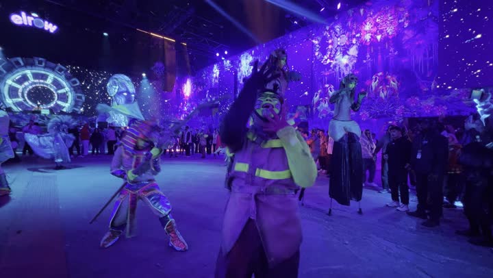 Illuminated characters in a theatrical performance on the platform of the Middle Beast Festival on December 13, 2025, in the Kingdom of Saudi Arabia, a gathering of the public enjoying the shows, festive night atmosphere, Middle Beast celebrations in Banban, Riyadh, entertainment and amusement for the Saudi people during the Riyadh season.