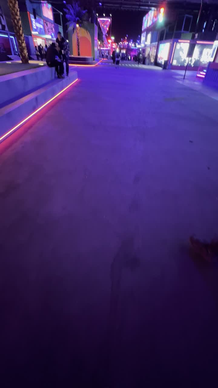 Visitors roamed in an enjoyable atmosphere filled with fun and entertainment, a nighttime ambiance in the outdoor activities area of the Soundstorm Middle Beast Festival in the Banban area of Riyadh, December 13, 2025, in the Kingdom of Saudi Arabia, with illuminated electronic screens, a family and youth experience as part of the Riyadh Season events.