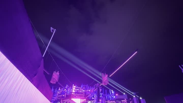 A glowing electronic screen, a family and youth experience within the events of Riyadh Season, enjoyable atmosphere filled with fun and entertainment, nighttime ambiance in the outdoor activities area at the Soundstorm Middle Beast Festival in the Banban area of Riyadh, December 13, 2025, in the Kingdom of Saudi Arabia.