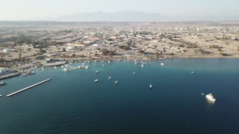 Nature and marine views, coastal areas in the Kingdom of Saudi Arabia, recreational tourist places, the waters of the Qial Sea with sand, Neom, the concept of Saudi tourism.