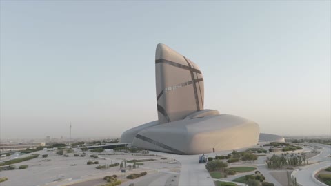 Recreational, cultural, and educational activities, a cultural beacon and famous tourist attractions in the Kingdom of Saudi Arabia, the building of the Ithra Global Museum in the Eastern Province in Dammam, and the King Abdulaziz Center for World Culture in Dhahran during the daytime.