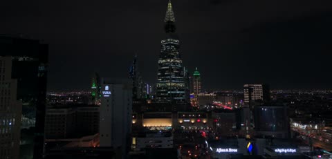 Famous places and landmarks, the architectural engineering art of towers and skyscrapers in the Kingdom of Saudi Arabia, aerial drone photography of the Kingdom Tower and Al Faisaliah Tower, famous landmarks of Riyadh.