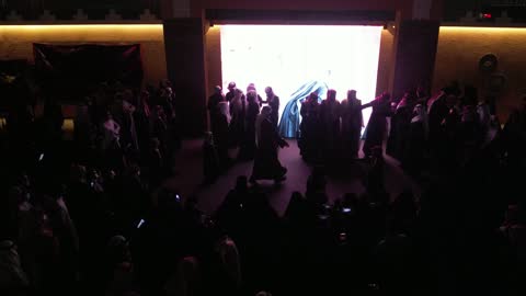 Drone footage of the founding ceremony of the first Saudi state on February 22 in the city of Tabuk, presenting a folkloric heritage show of the Najdi Arda, Saudi National Day on September 23, the day we began in 1727, wearing traditional folk attire.