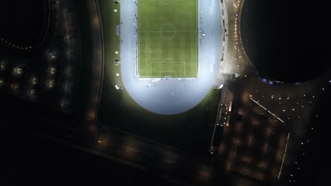 Interest in sports and entertaining recreational activities, drone photography of the Jewel Stadium in King Abdullah Sports City in Jeddah, a global sports destination for hosting the World Cup, modern architectural engineering art.